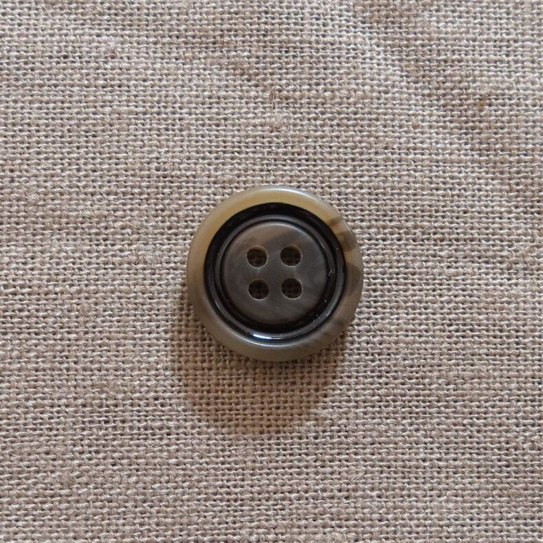 Rund matt knapp med blank ring